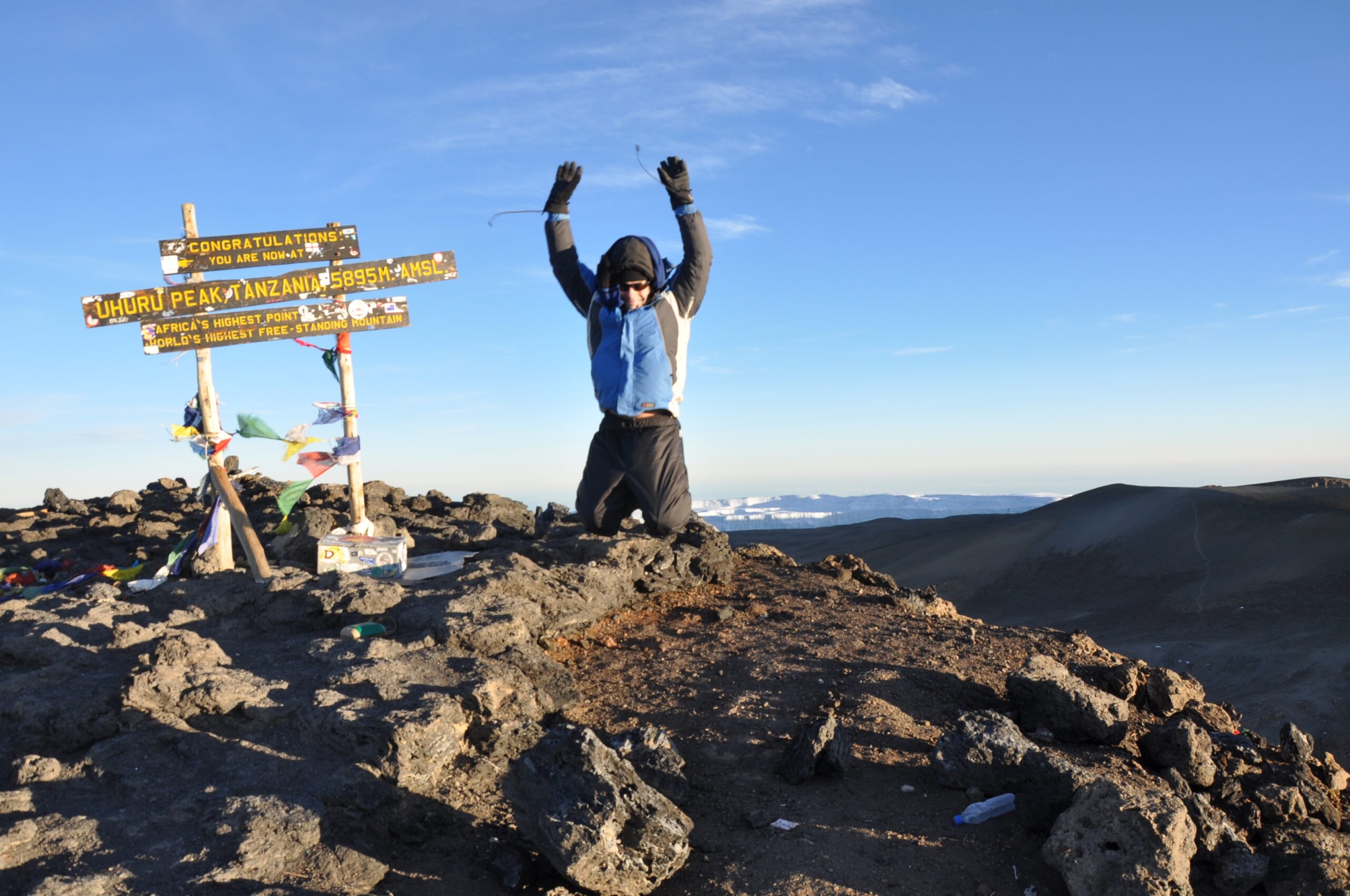 Mount Kilimanjaro is an inactive stratovolcano in north-eastern Tanzania. At 5,891.8 metres (19,330 ft) it is the tallest freestanding mountain on earth; and as the highest point in Africa, Uhuru Peak is one of the Seven Summits (The highest mountains of each of the seven continents). Due to Kilimanjaro's equatorial location and high elevation, almost every climate type on earth is represented, including a year-round snow-topped summit. While it is inactive, Kilimanjaro has fumaroles that emit gas in the crater on the main summit of Kibo. Scientists concluded in 2003 that molten magma is just 400 metres (1,310 ft) below the summit crater. Several collapses and landslides have occurred on Kibo in the past, one creating the area known as the Western Breach.There are several routes by which to climb Mt Kilimanjaro, namely, Marangu, Rongai, Lemosho, Shira, Umbwe and Machame. Of all the routes, Machame is by far the most scenic albeit steeper route up the mountain, which can be done in 6 or 7 days. The Rongai is the easiest camping route and the Marangu is also easy, but accommodation is in huts. As a result, this route tends to be very busy and ascent and descent routes are the same [Edited from Wikipedia.org]