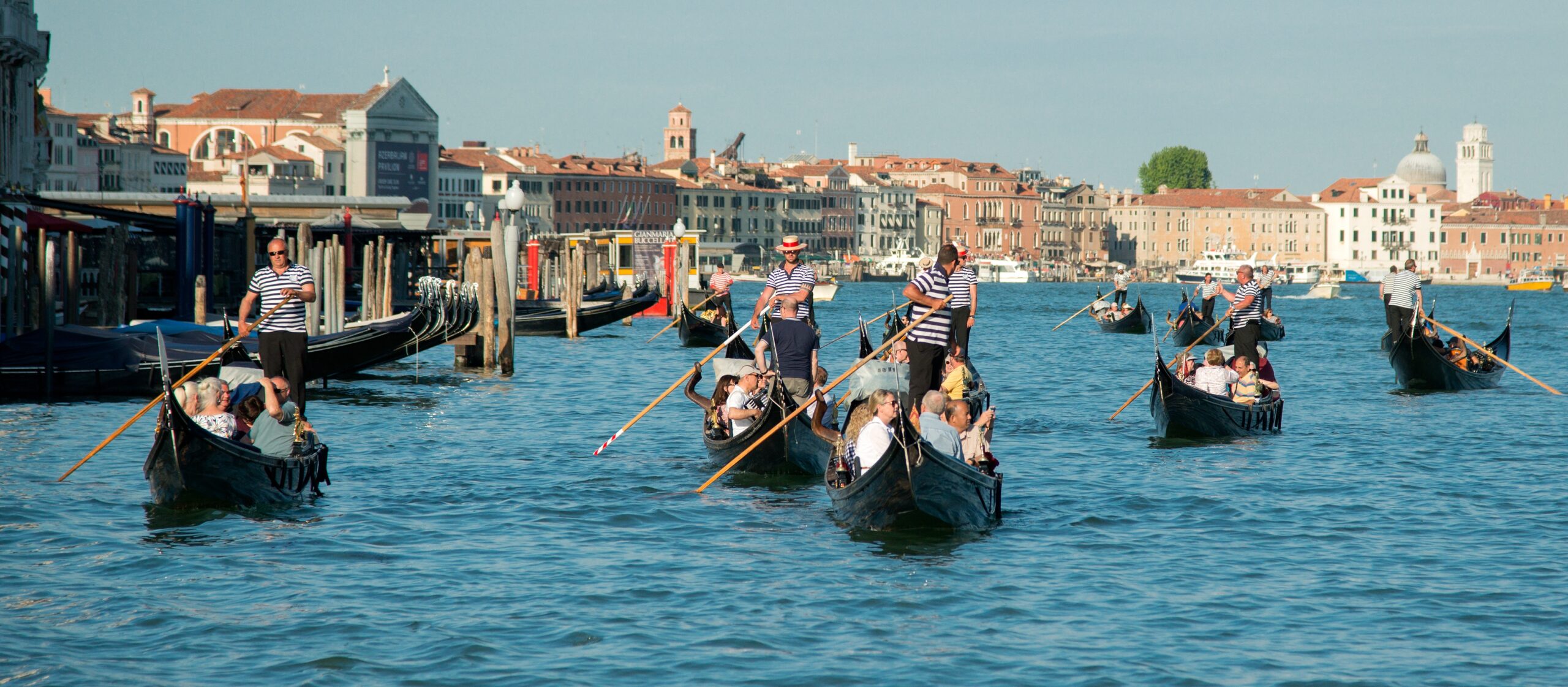 A group of gondolas with passengers.