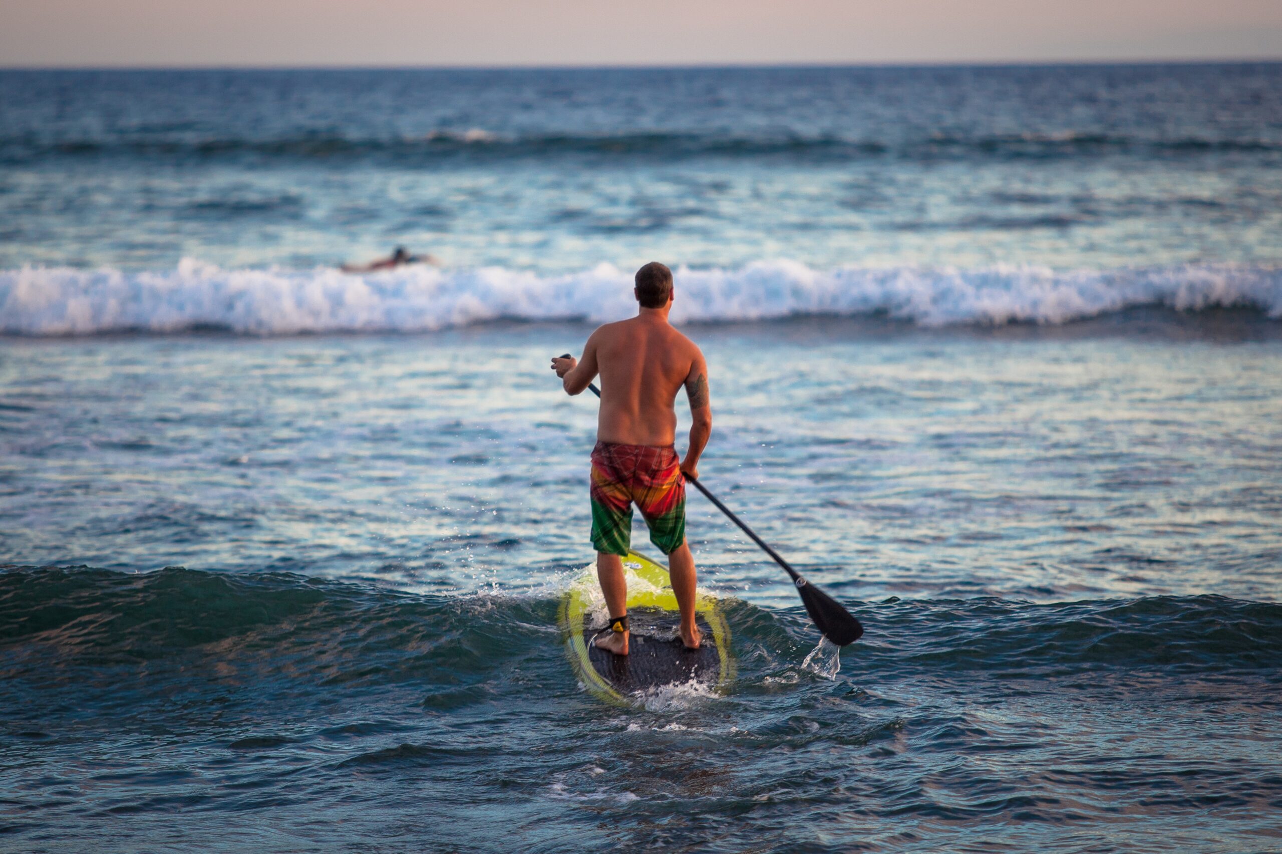 Looking for that perfect getaway location? Look no farther than Hawaiian Islands Humpback Whale National Marine Sanctuary! Whether you love water sports, wildlife watching, beach bumming, or simply taking in some incredible views, the sanctuary has something for you. Here, a paddle boarder enjoys a sunset ride through the surf. Photo Credit: Matt McIntosh/NOAA