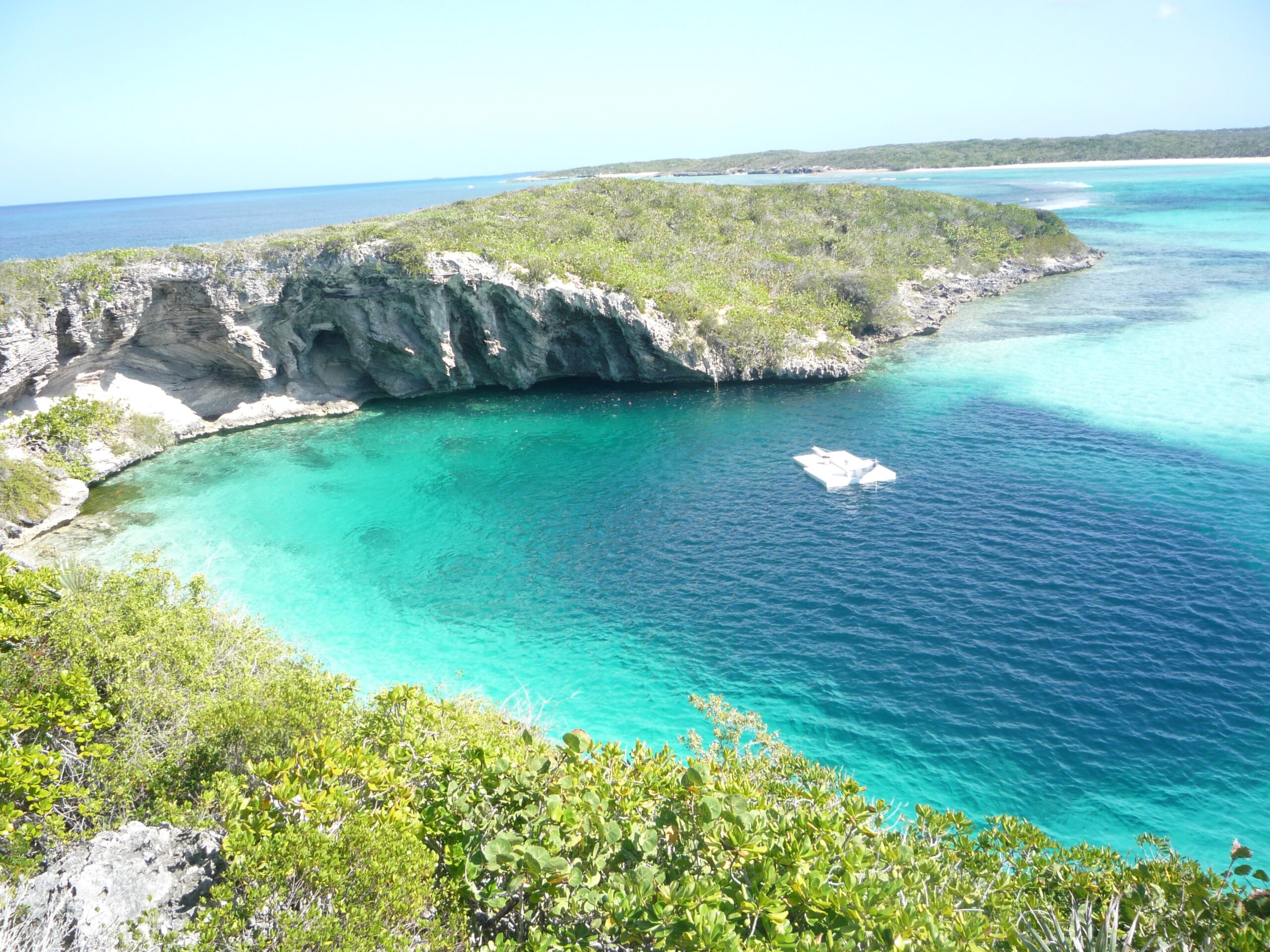 Dean's Blue Hole is the world's second deepest known blue hole with seawater. It plunges 202 meters (663 ft) in a bay west of Clarence Town on Long Island, Bahamas.