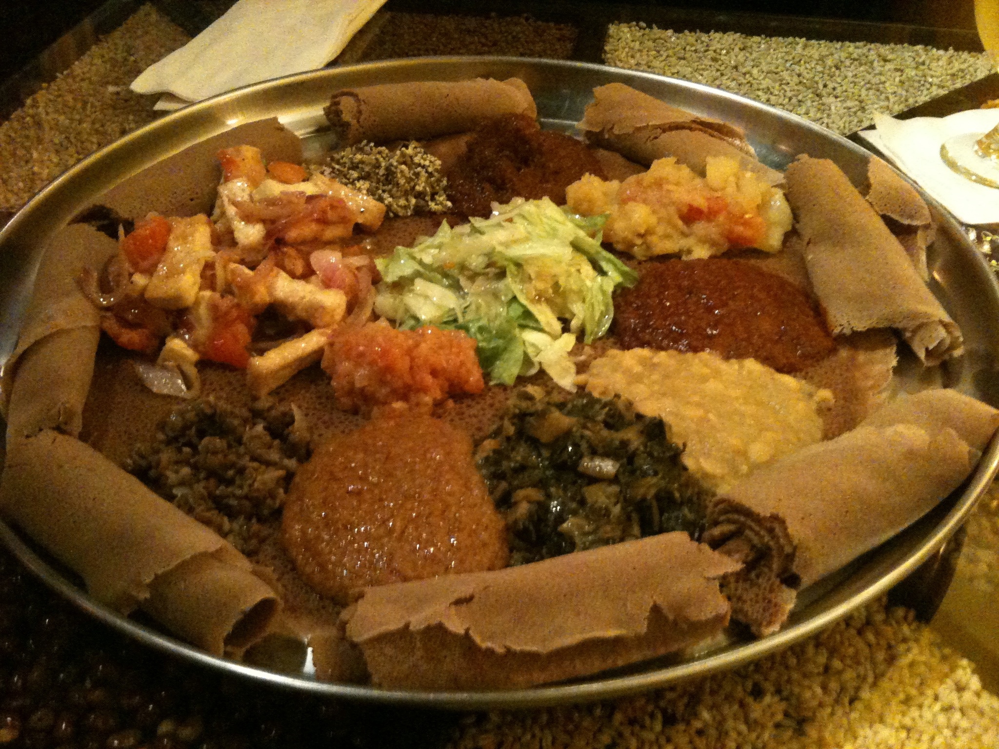 Vegi Special (Miser Wot, Yekik Alich, Yegomen Wot, Tikel Gomen, Shiro, Azifa, Yshimbra Wot, Seljo, Yesuf Fitfit, Yetimatim Fitfit, Karia and Selata) plus Tofu Tibs