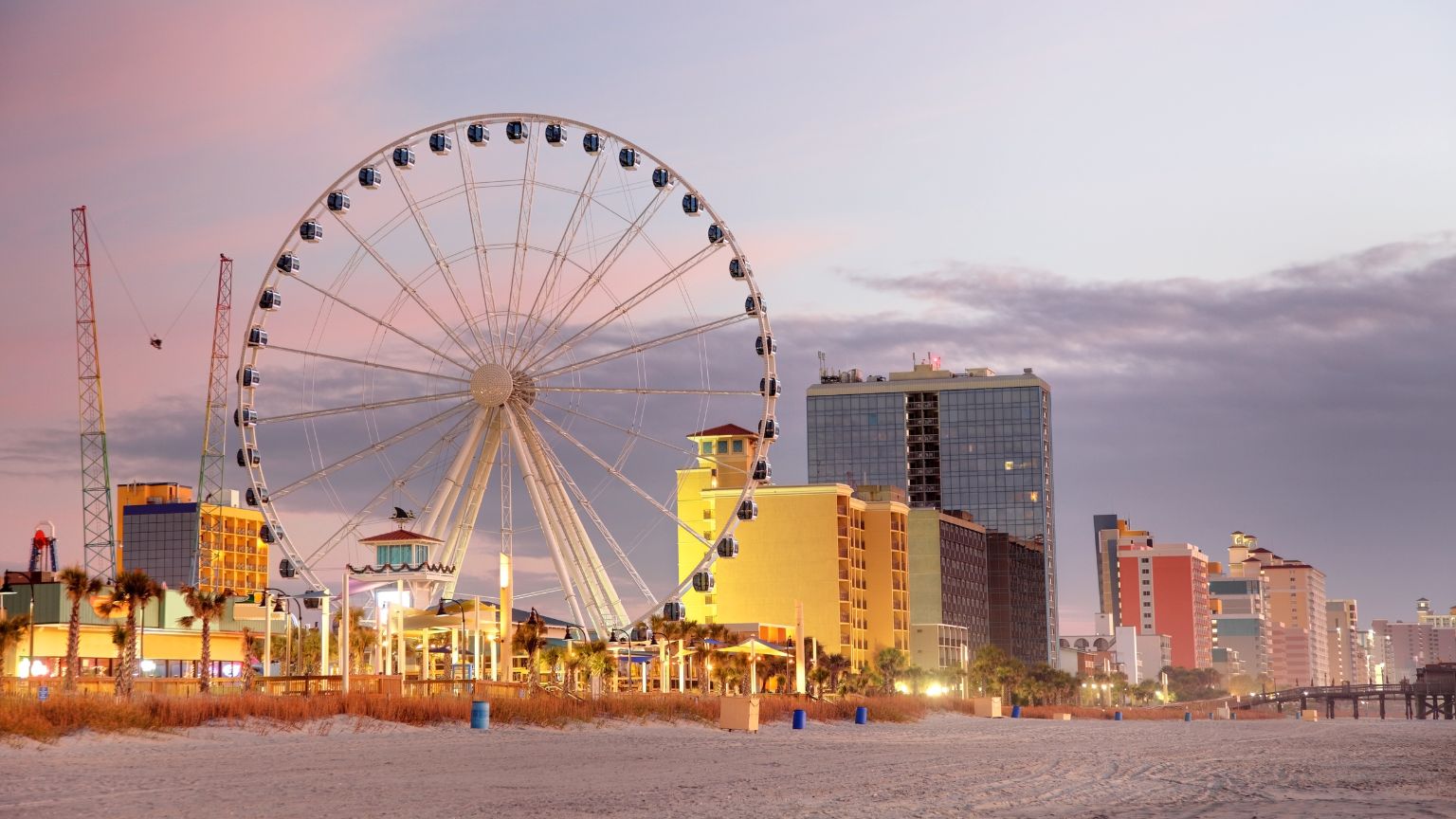 beach buildings Ferris wheel 