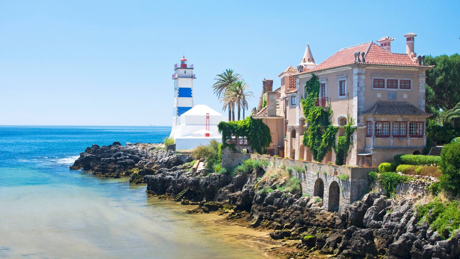 portugal villa lighthouse beach water