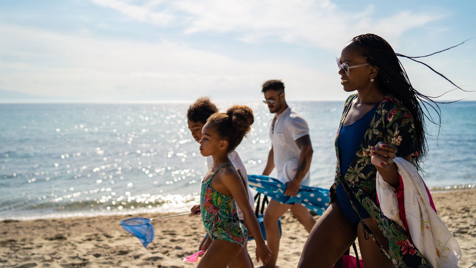 couple with children on beach 