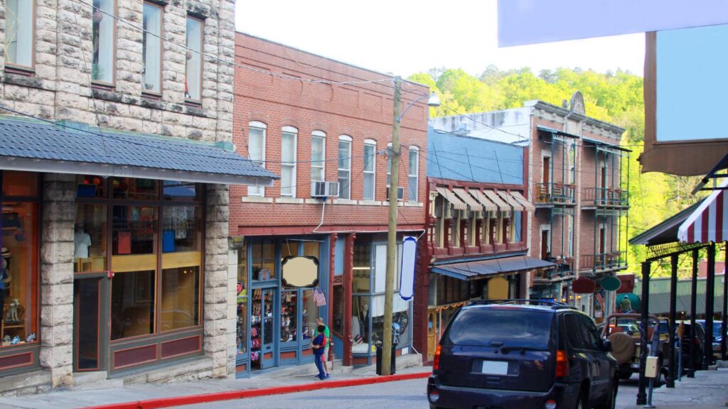 eureka springs main street buildings cars