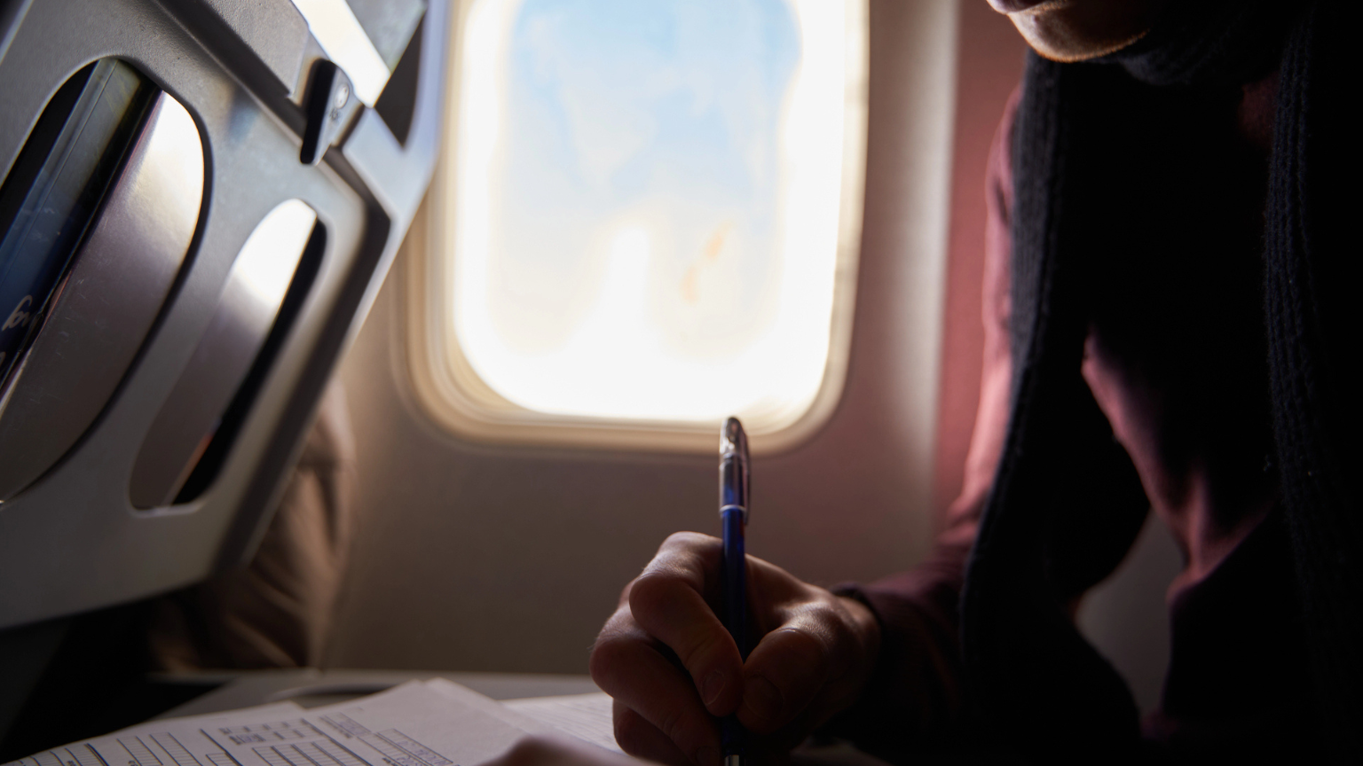The One Thing Travel Pros Always Pack on International Flights — And It’s Not a Neck Pillow